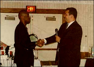 Kevin receiving thePan-hellenic Council Award